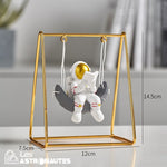 figurine astronaute balançoire lecteur