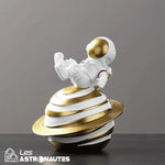 figurine astronaute joueur or