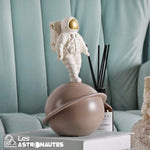 figurine astronaute saturne